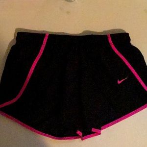 Pink and black nike shorts